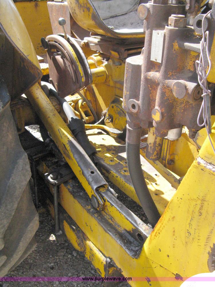 image for item 8239 Massey-Ferguson 30 tractor with loader and backhoe attachment