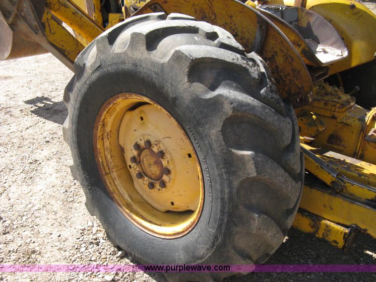 image for item 8239 Massey-Ferguson 30 tractor with loader and backhoe attachment