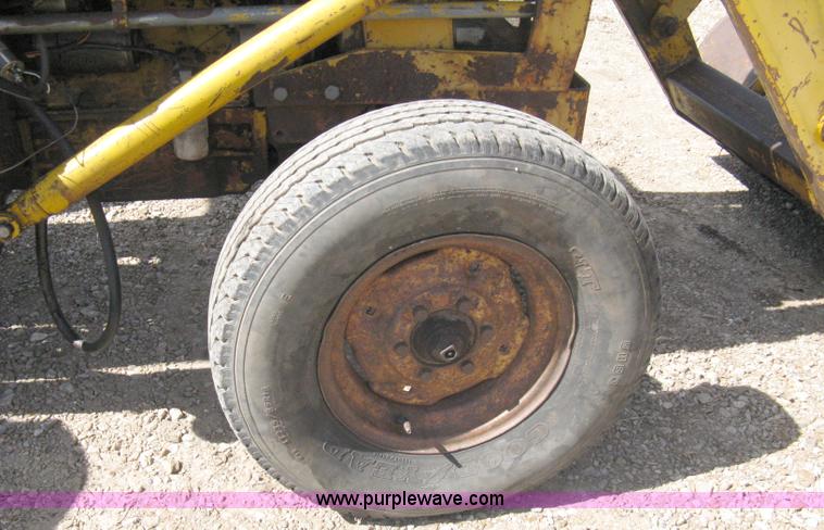 image for item 8239 Massey-Ferguson 30 tractor with loader and backhoe attachment