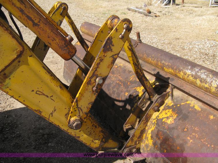 image for item 8239 Massey-Ferguson 30 tractor with loader and backhoe attachment