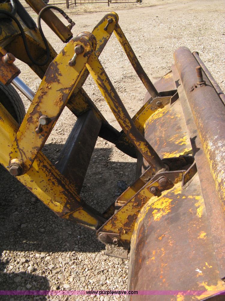 image for item 8239 Massey-Ferguson 30 tractor with loader and backhoe attachment
