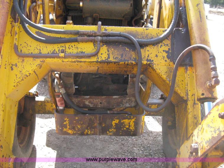 image for item 8239 Massey-Ferguson 30 tractor with loader and backhoe attachment