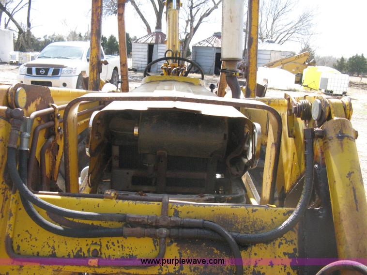 image for item 8239 Massey-Ferguson 30 tractor with loader and backhoe attachment