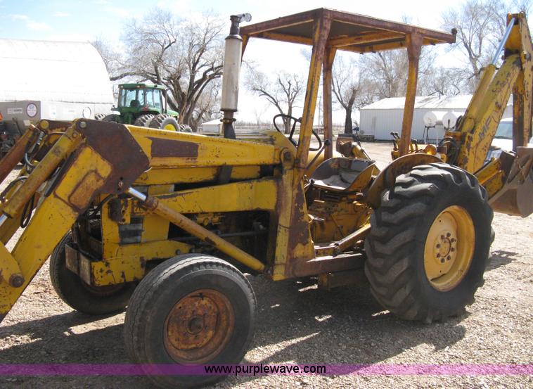 image for item 8239 Massey-Ferguson 30 tractor with loader and backhoe attachment