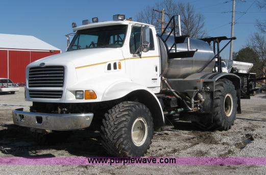 image for item 5393 2000 Sterling L8513 liquid sprayer truck with 90' aluminum booms