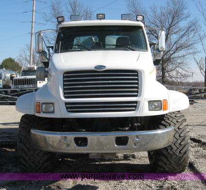 image for item 5393 2000 Sterling L8513 liquid sprayer truck with 90' aluminum booms