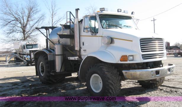 image for item 5393 2000 Sterling L8513 liquid sprayer truck with 90' aluminum booms