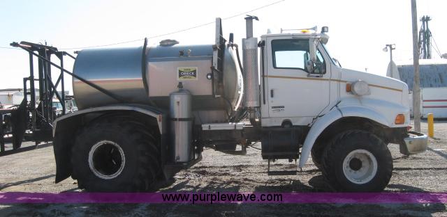 image for item 5393 2000 Sterling L8513 liquid sprayer truck with 90' aluminum booms