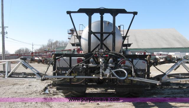 image for item 5393 2000 Sterling L8513 liquid sprayer truck with 90' aluminum booms