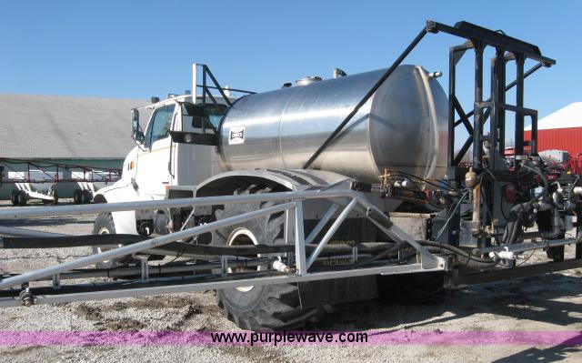 image for item 5393 2000 Sterling L8513 liquid sprayer truck with 90' aluminum booms