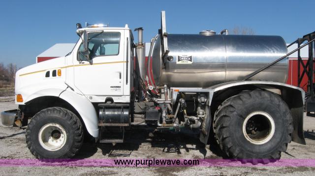 image for item 5393 2000 Sterling L8513 liquid sprayer truck with 90' aluminum booms