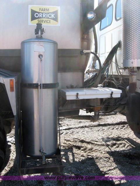 image for item 5393 2000 Sterling L8513 liquid sprayer truck with 90' aluminum booms