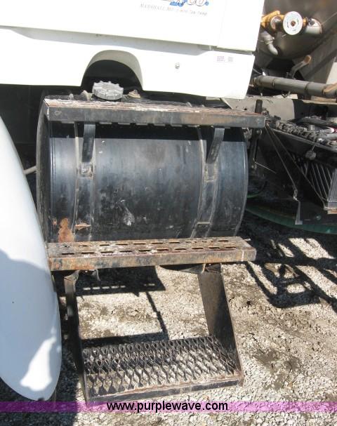 image for item 5393 2000 Sterling L8513 liquid sprayer truck with 90' aluminum booms