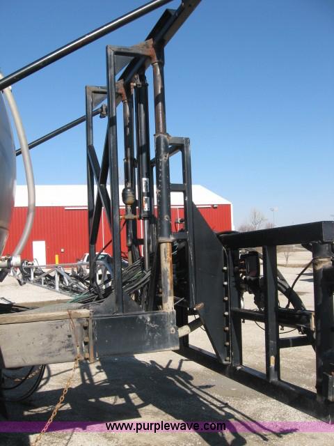 image for item 5393 2000 Sterling L8513 liquid sprayer truck with 90' aluminum booms