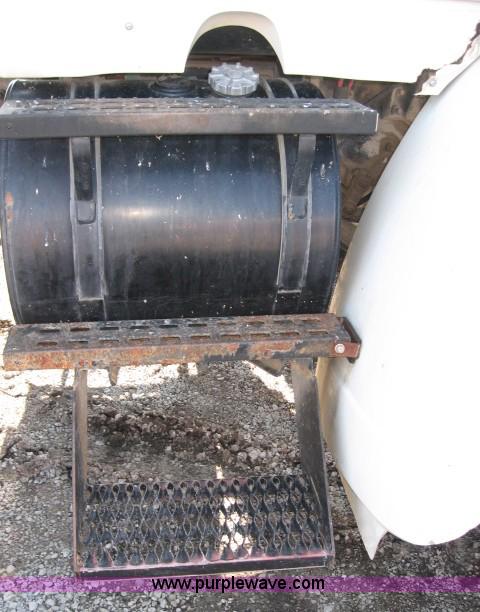 image for item 5393 2000 Sterling L8513 liquid sprayer truck with 90' aluminum booms