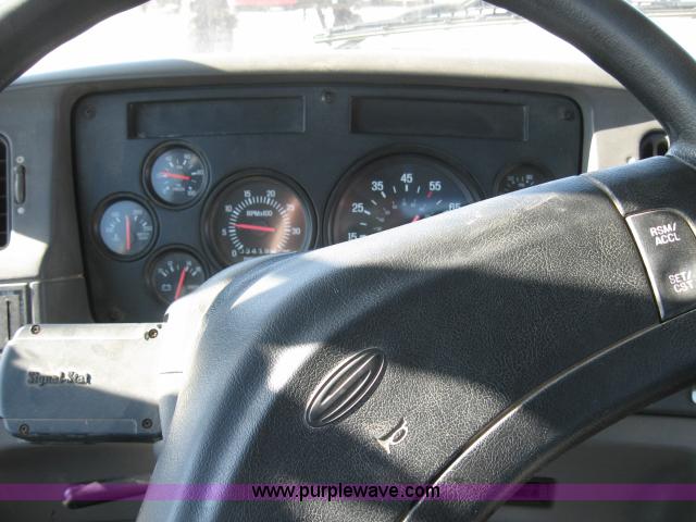 image for item 5393 2000 Sterling L8513 liquid sprayer truck with 90' aluminum booms