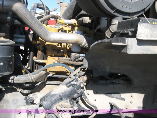 image for item 5393 2000 Sterling L8513 liquid sprayer truck with 90' aluminum booms