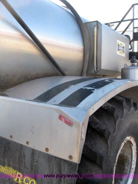 image for item 5393 2000 Sterling L8513 liquid sprayer truck with 90' aluminum booms