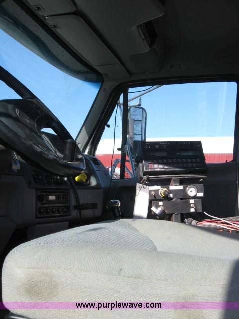 image for item 5393 2000 Sterling L8513 liquid sprayer truck with 90' aluminum booms