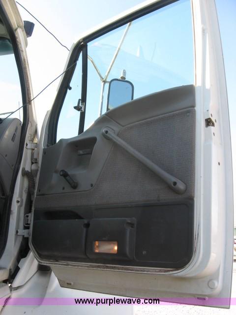 image for item 5393 2000 Sterling L8513 liquid sprayer truck with 90' aluminum booms