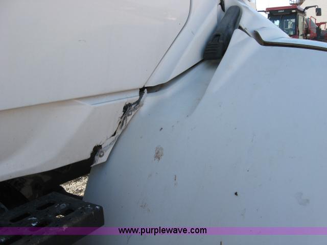 image for item 5393 2000 Sterling L8513 liquid sprayer truck with 90' aluminum booms