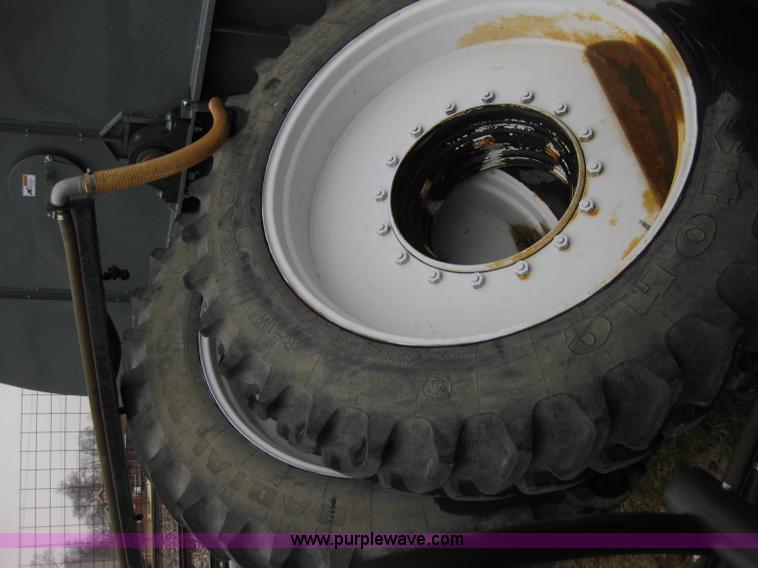 image for item 5393 2000 Sterling L8513 liquid sprayer truck with 90' aluminum booms