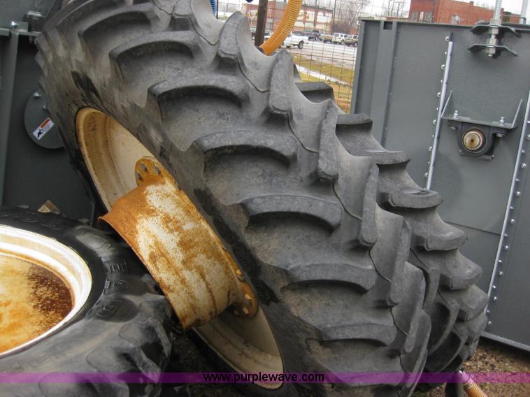 image for item 5393 2000 Sterling L8513 liquid sprayer truck with 90' aluminum booms