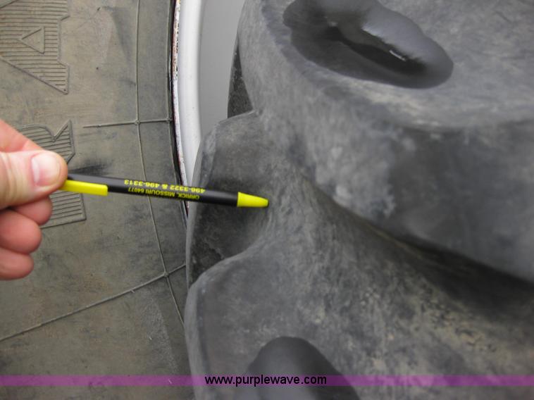 image for item 5393 2000 Sterling L8513 liquid sprayer truck with 90' aluminum booms