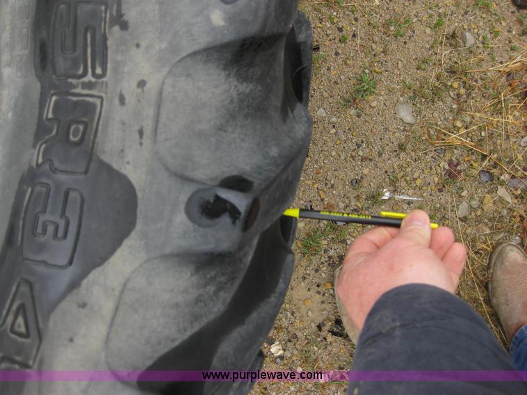 image for item 5393 2000 Sterling L8513 liquid sprayer truck with 90' aluminum booms