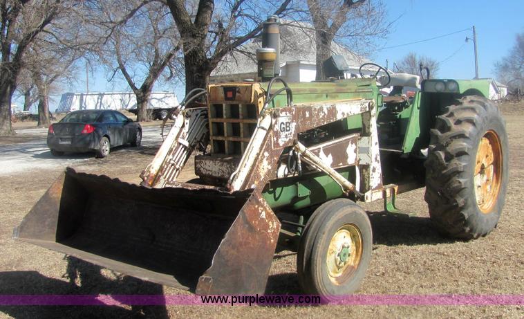 image for item 6931 Oliver 1850 tractor with loader