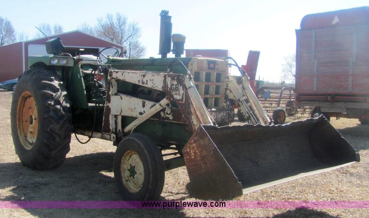 image for item 6931 Oliver 1850 tractor with loader