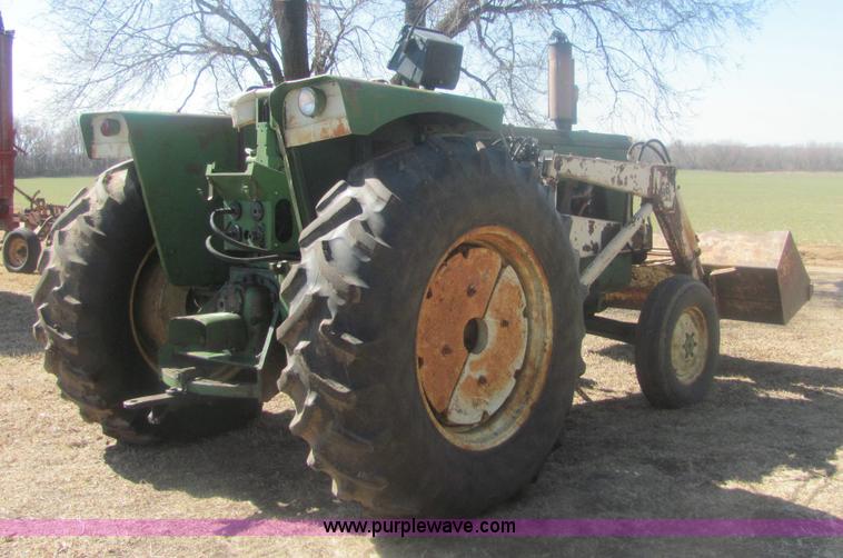 image for item 6931 Oliver 1850 tractor with loader