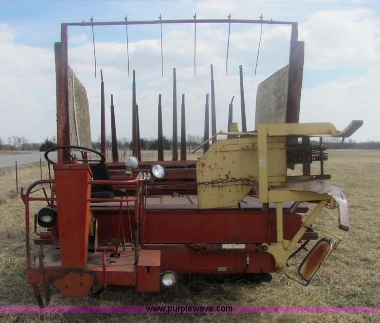 image for item 6983 New Holland 1047 self propelled small square stacker