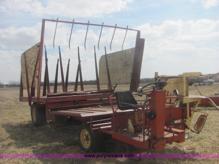 image for item 6983 New Holland 1047 self propelled small square stacker