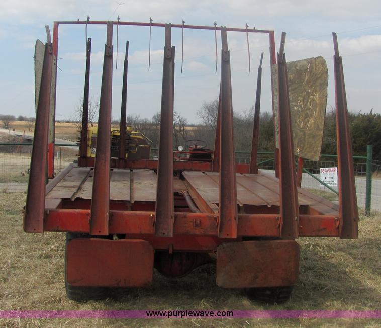 image for item 6983 New Holland 1047 self propelled small square stacker