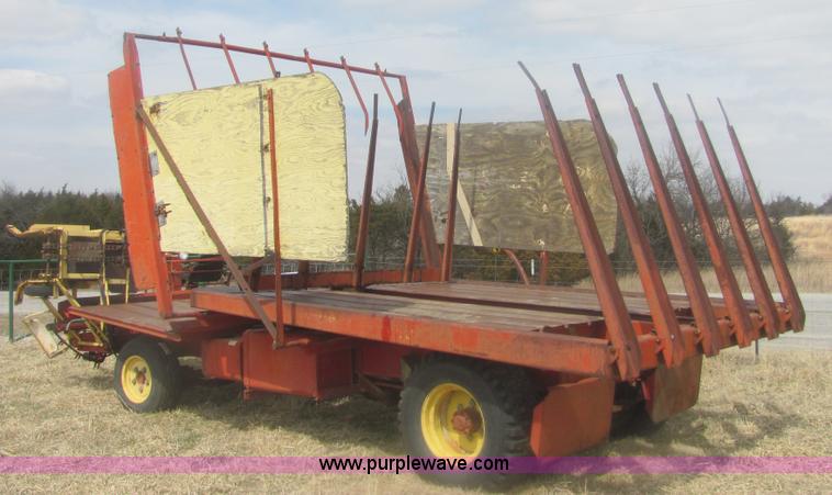 image for item 6983 New Holland 1047 self propelled small square stacker