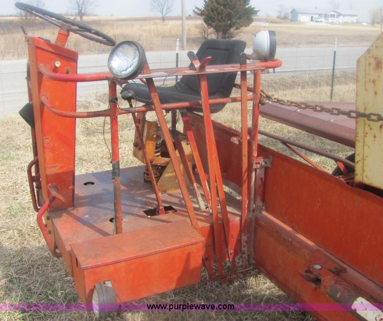 image for item 6983 New Holland 1047 self propelled small square stacker