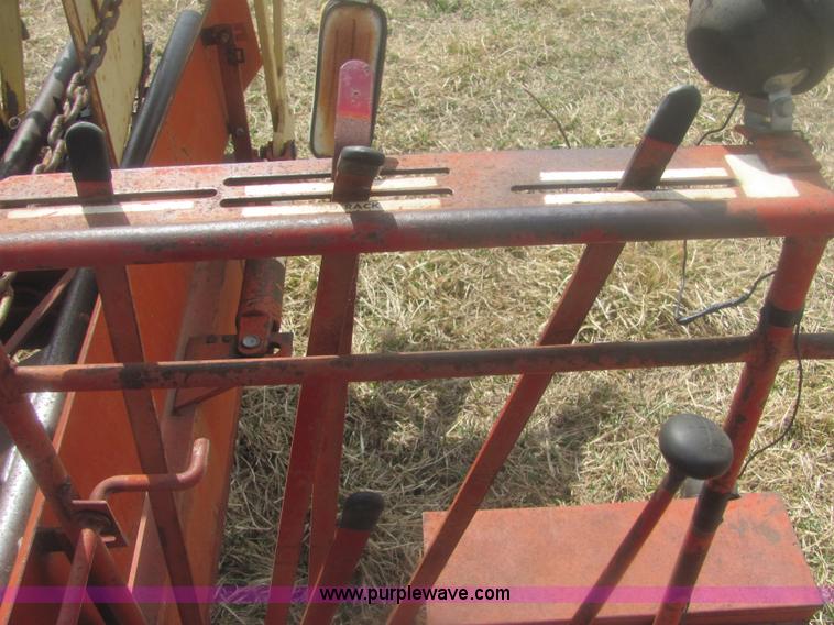 image for item 6983 New Holland 1047 self propelled small square stacker