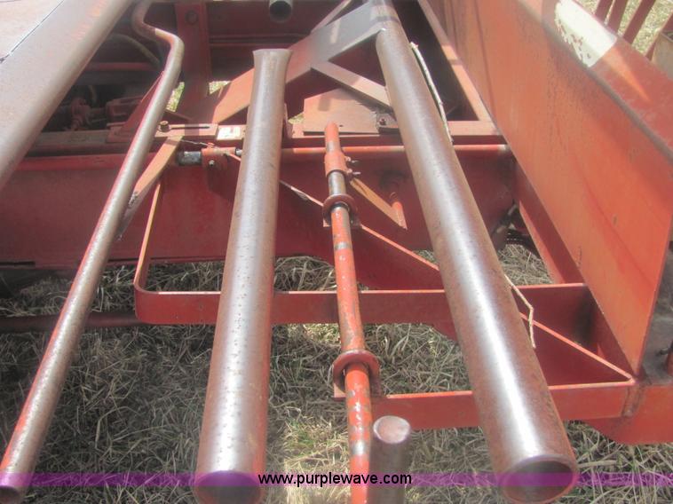 image for item 6983 New Holland 1047 self propelled small square stacker