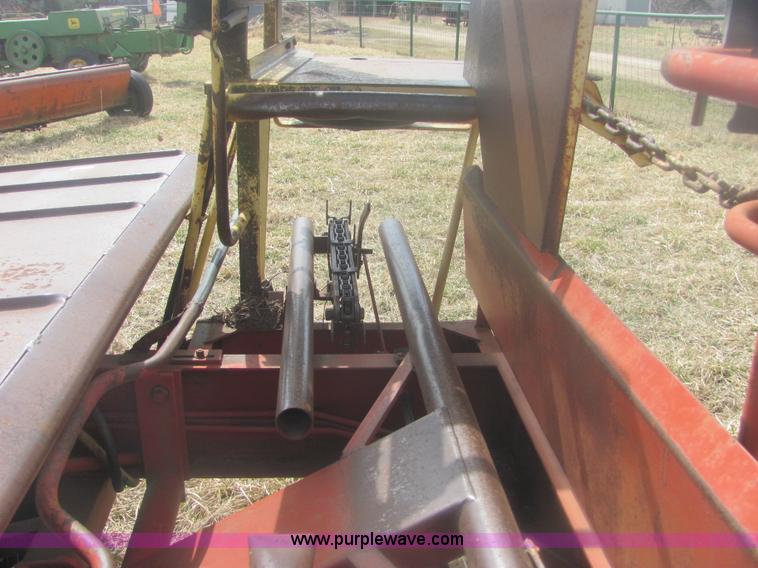 image for item 6983 New Holland 1047 self propelled small square stacker