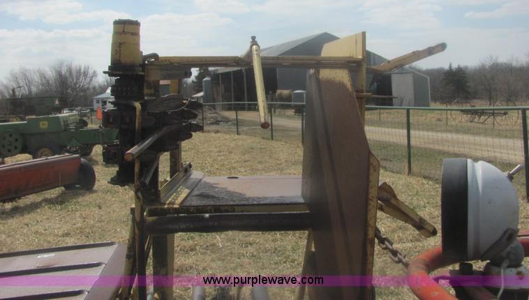 image for item 6983 New Holland 1047 self propelled small square stacker