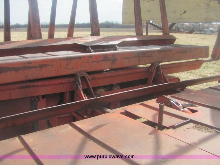 image for item 6983 New Holland 1047 self propelled small square stacker