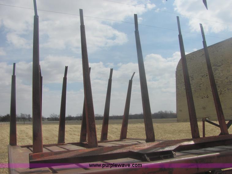 image for item 6983 New Holland 1047 self propelled small square stacker