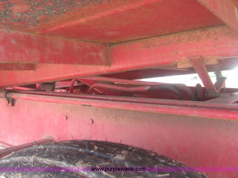 image for item 6983 New Holland 1047 self propelled small square stacker