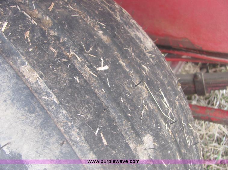 image for item 6983 New Holland 1047 self propelled small square stacker