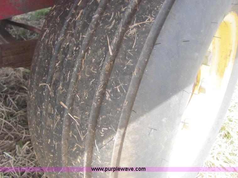 image for item 6983 New Holland 1047 self propelled small square stacker