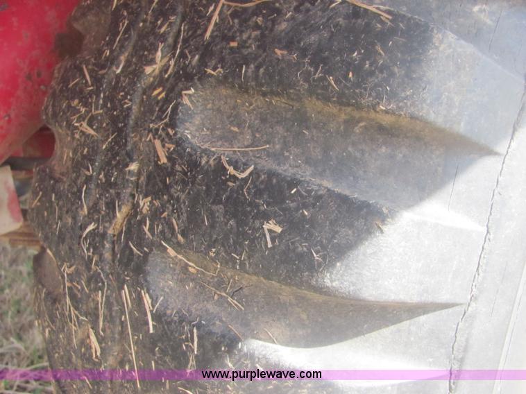 image for item 6983 New Holland 1047 self propelled small square stacker