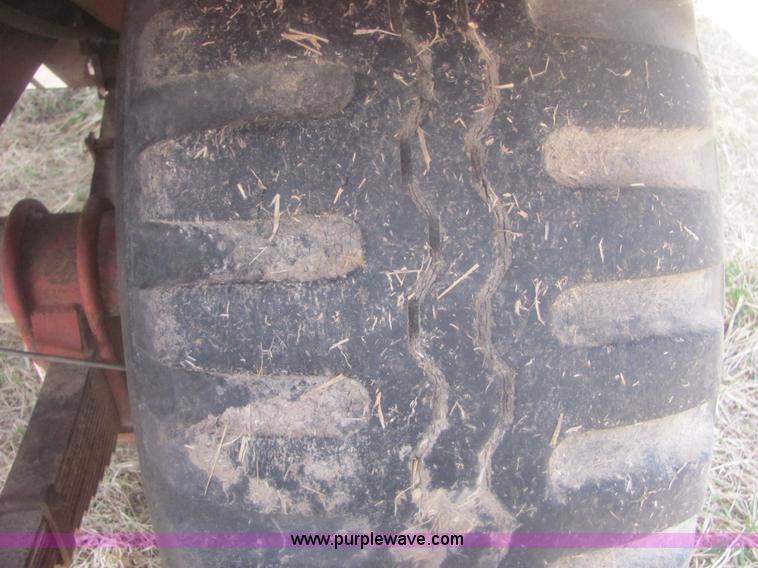 image for item 6983 New Holland 1047 self propelled small square stacker