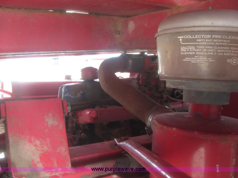 image for item 6983 New Holland 1047 self propelled small square stacker