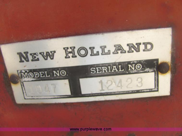 image for item 6983 New Holland 1047 self propelled small square stacker